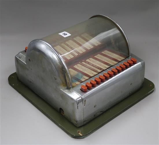 A small chromium plated jukebox 33cm